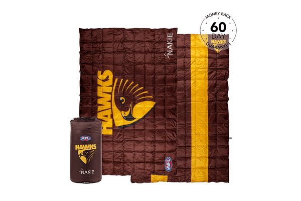 Maroon and gold Hawthorn Hawks AFL puffy blanket with hawk logo, shown unfolded with matching compression bag
