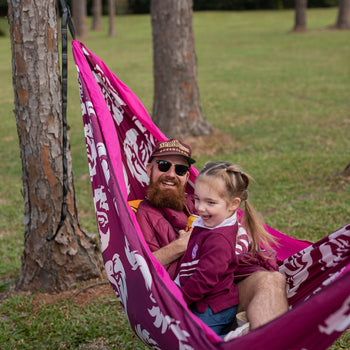 Man and child relaxing in Manly Sea Eagle NRL Nakie Recycled Hammock 